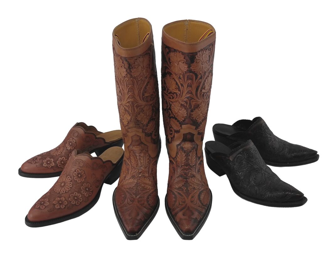 Hand-tooled cowboy boots and mules in brown and black leather